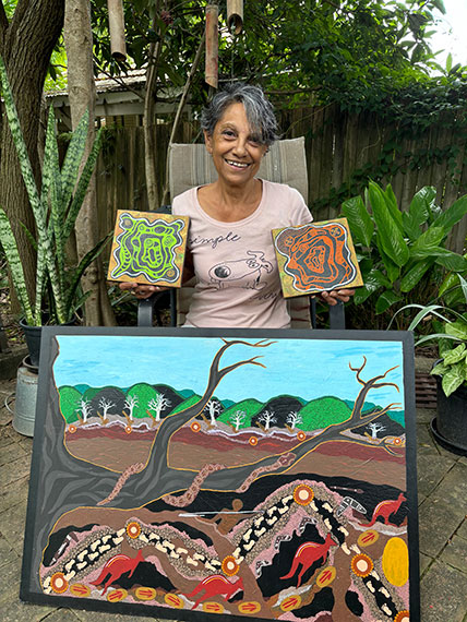 old woman with some paintings