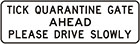 white sign with black text, tick quarantine gate ahead, please drive slowly