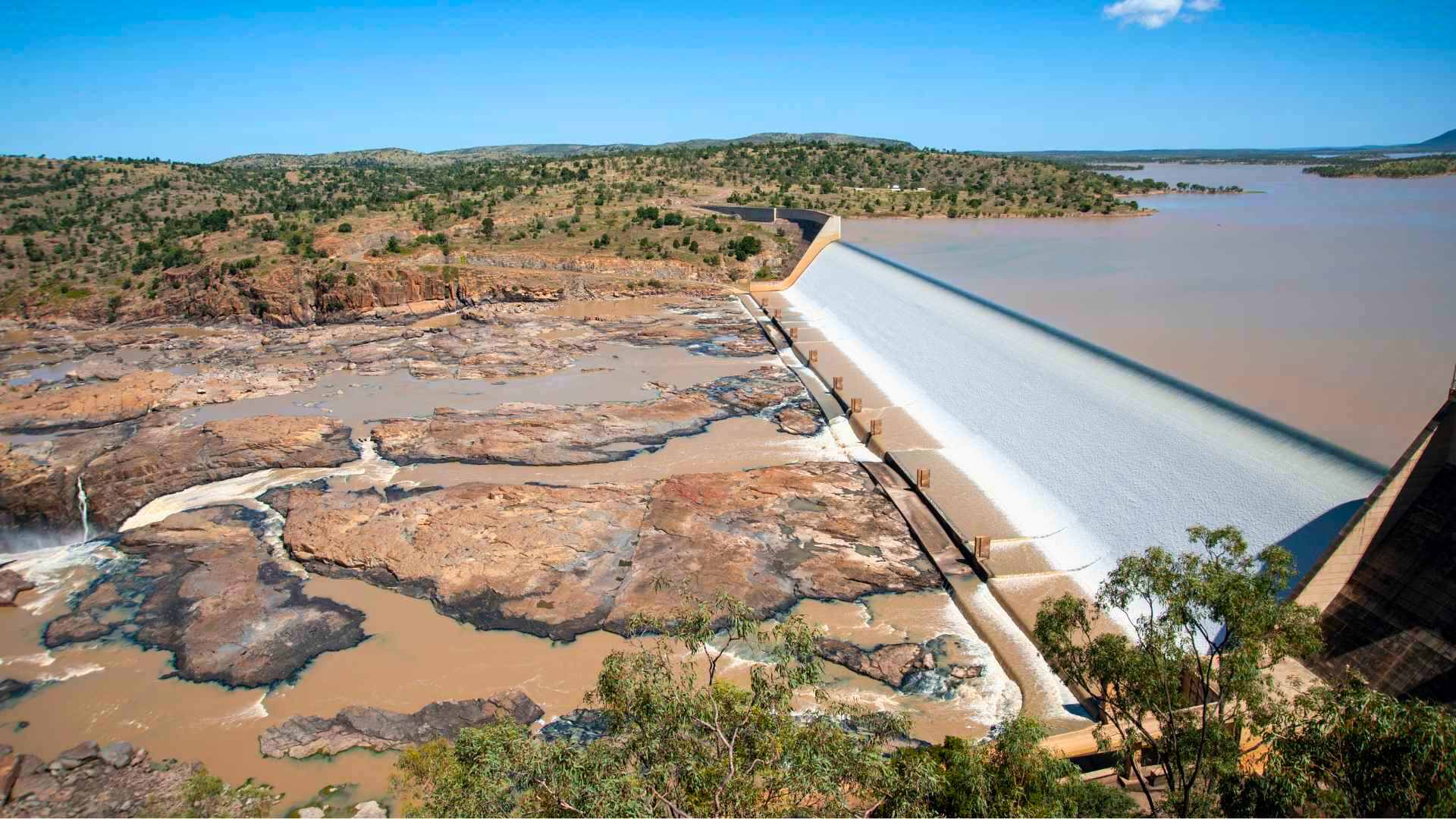Burdekin Dam spillway releasing water into the river below.
