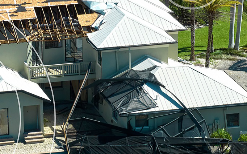 photo of damaged houses in Queensland after a cyclone
