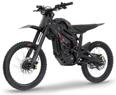 Side view of a black dirt bike with some red trim on the body of the bike