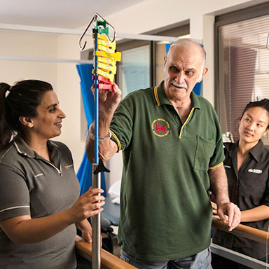 Patient undertaking physiotherapy rehabilitation